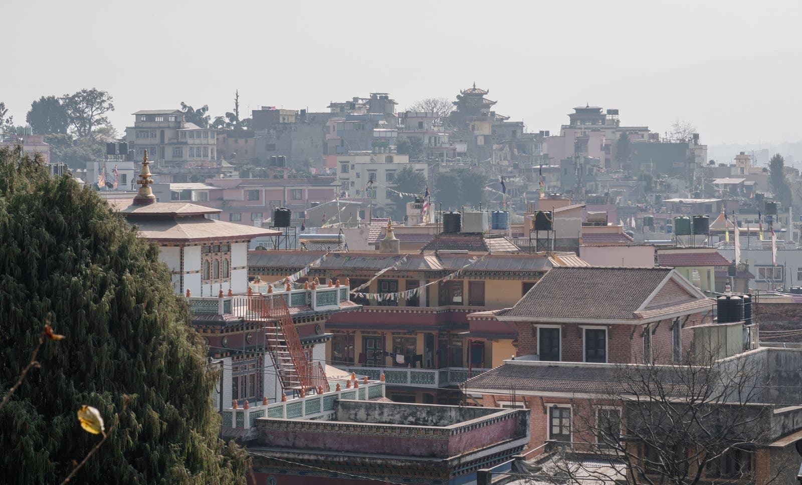 Rooftops of Kathmandu with traditional pagoda-style buildings